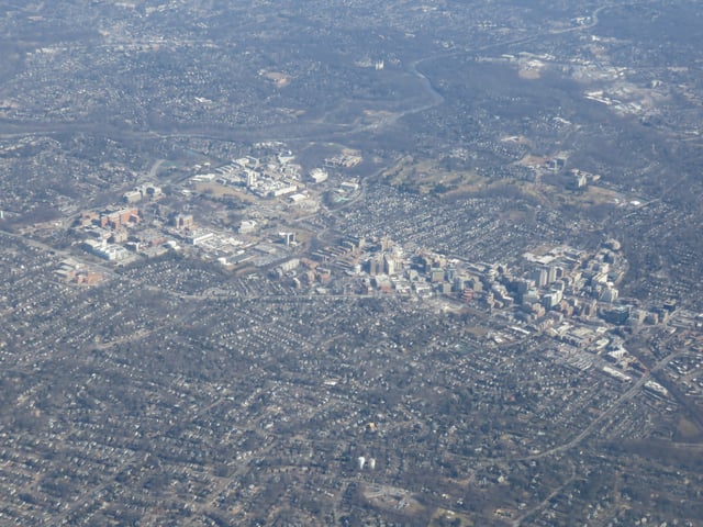 Aerial view of Downtown Bethesda, with the National Institutes of Health campus and Walter Reed National Military Medical Center campus to the right
