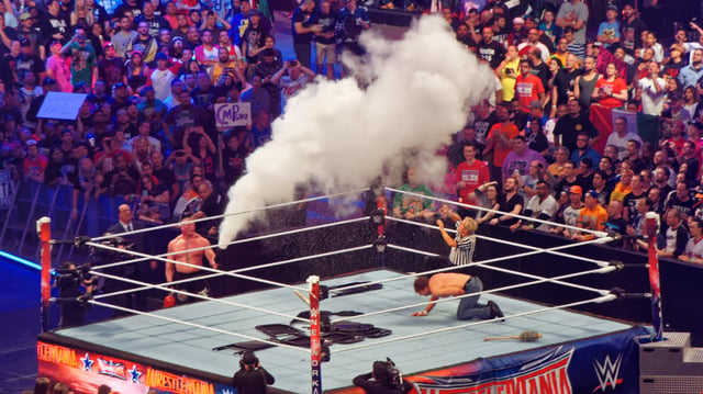 Lesnar and Dean Ambrose during their match at WrestleMania 32
