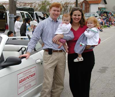 Plant City Strawberry Festival, Congressman Putnam with wife Melissa and their daughters at the Strawberry Parade in Plant City, Florida,