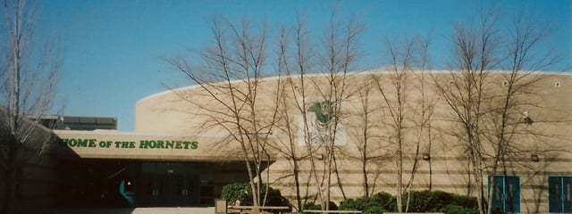 Entrance to Roswell High School. The gymnasium (aka the Stinger Dome) is visible with its domed roof.