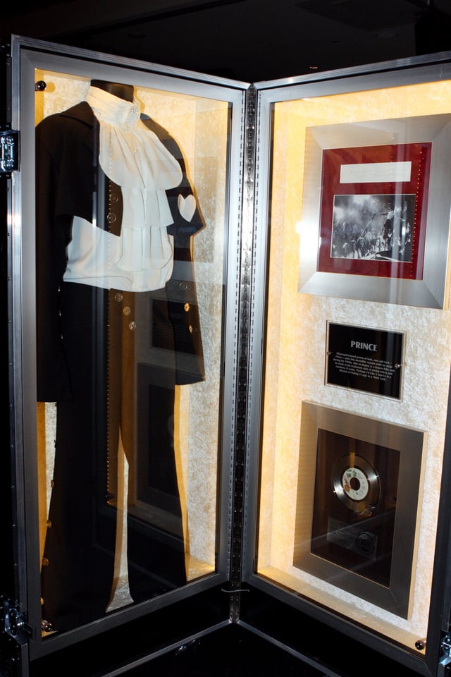 A costume worn by Prince and associated memorabilia, displayed at a Hard Rock Cafe in Australia