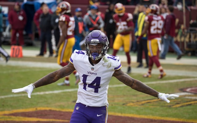 Diggs celebrating after scoring a touchdown against the Washington Redskins.