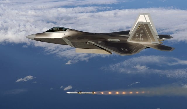 A USAF F-22A Raptor firing an AIM-120 air to air missile.