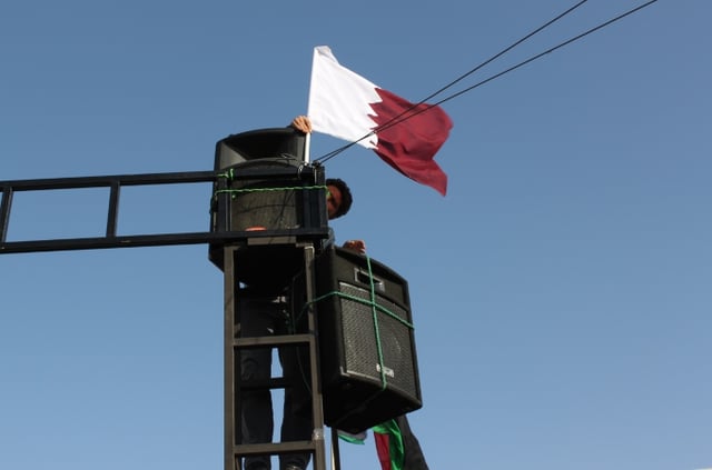 Qatar's flag in Libya after the Libyan Civil War; Qatar played an influential role during the Arab Spring.