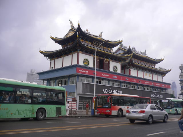 Folk temple on the rooftop of a commercial building in the city of Wenzhou.