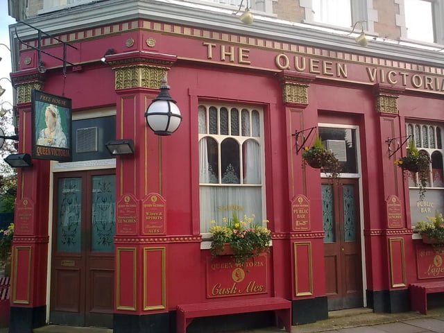 The Queen Victoria Public House (as it looked from November 1992 to September 2010) is the main focus point of Albert Square (pictured).
