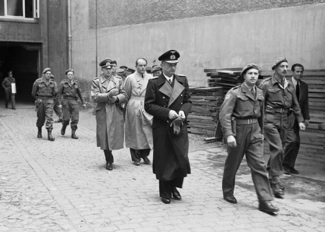 Three members of the Flensburg Government, General Alfred Jodl, Dr Albert Speer, and Grand Admiral Karl Dönitz, after their arrest by the Allies.