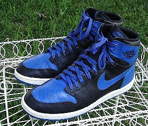 A pair of Nike Air Jordan I basketball shoes
