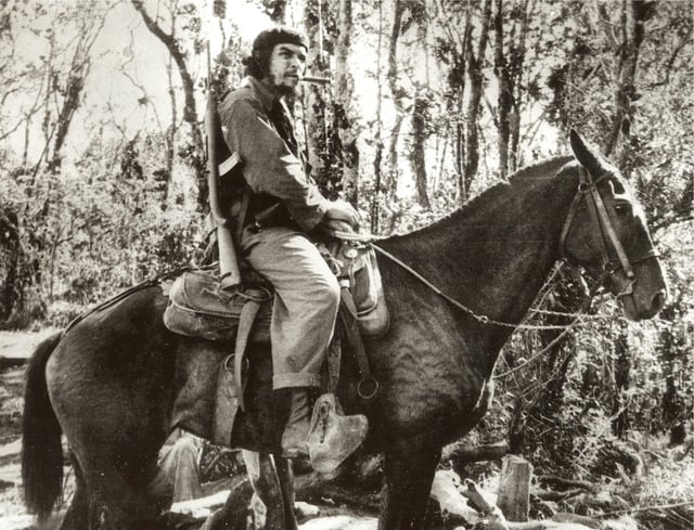 Guevara atop a mule in Las Villas province, Cuba, November 1958