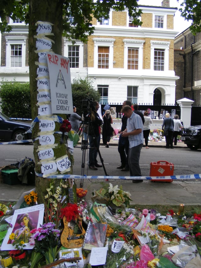 Tributes outside Amy Winehouse's home at Camden Square days following her death on 23 July 2011