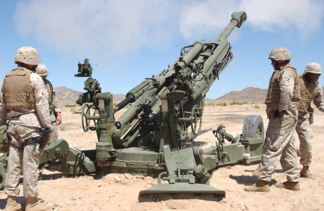 US Marine gunners test fire a GCS Weapons M777 howitzer.