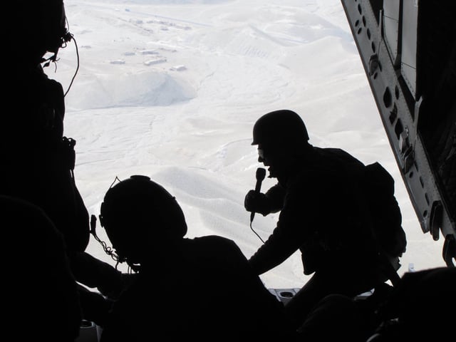 Holt in 2010 photographed by the United States Air Force while reporting on an airdrop mission in Afghanistan
