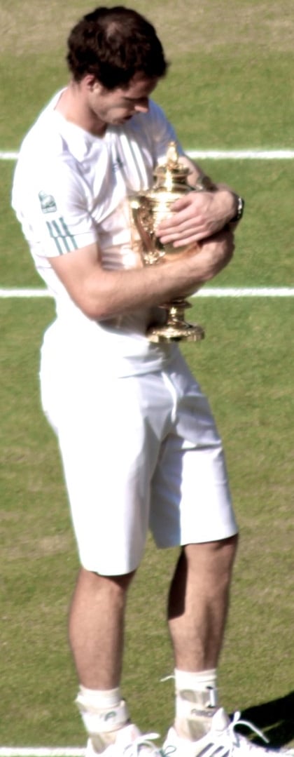 Murray holds the Wimbledon trophy following his victory in the 2013 men's final