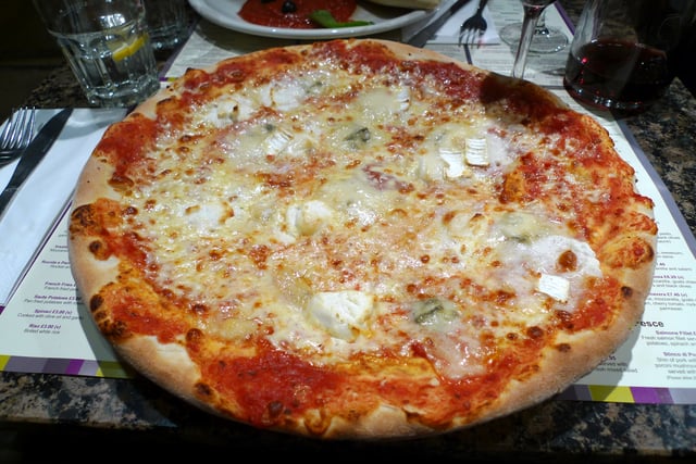 A pizza quattro formaggi (Italian: [ˈkwattro forˈmaddʒi], "four cheeses") in London