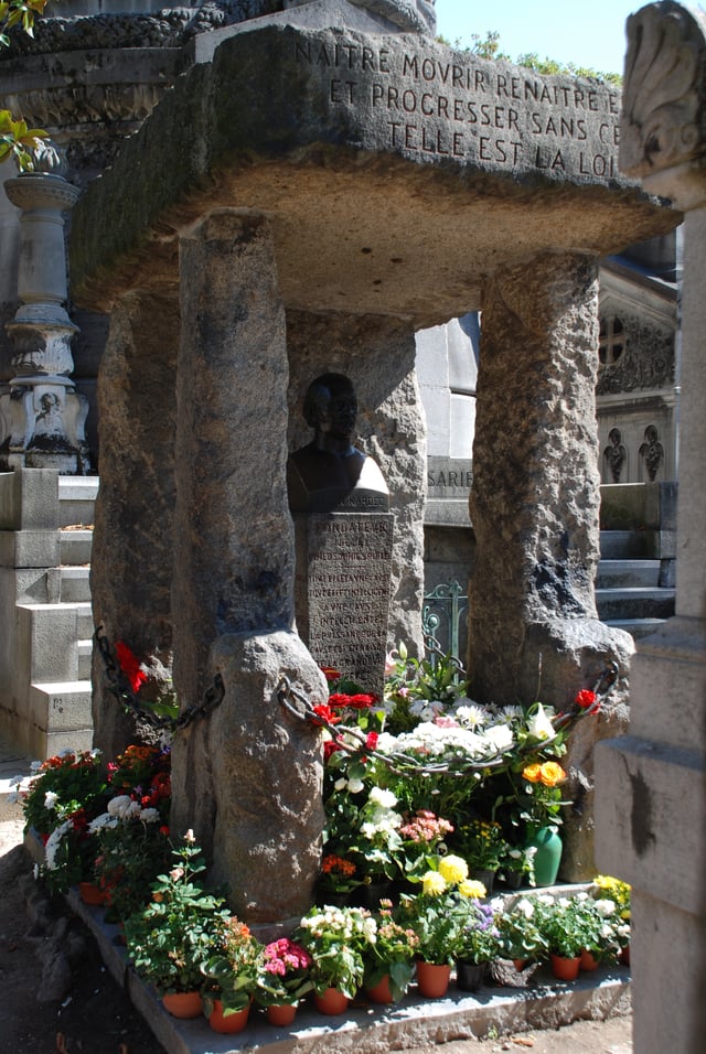 Tomb of Allan Kardec, founder of spiritism. The inscription says in French "To be born, die, again be reborn, and so progress unceasingly, such is the law".
