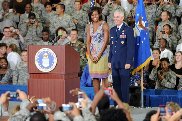 Obama and General Charles R. Davis smile to the crowd before speaking on her mission to help military families, October 2009.