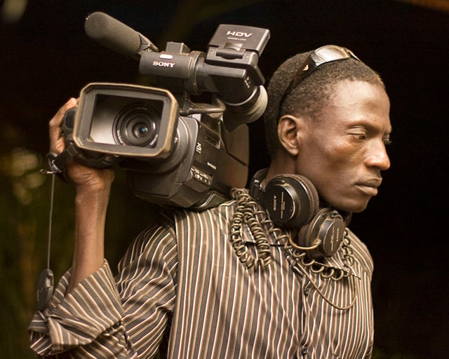 A Burkinabé photographer at work in Ouagadougou.