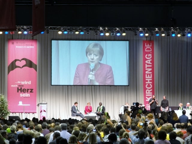 Merkel speaking at the 2011 German Evangelical Church Assembly in Dresden.