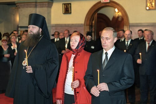 Vladimir Putin and his wife attending a commemoration service for the victims of the September 11 attacks on November 16, 2001