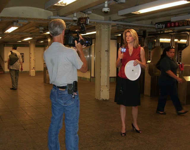 Reporter Kathryn Brown reporting on the Summer 2012 North American heat wave from the Times Square subway station on July 18, 2012.