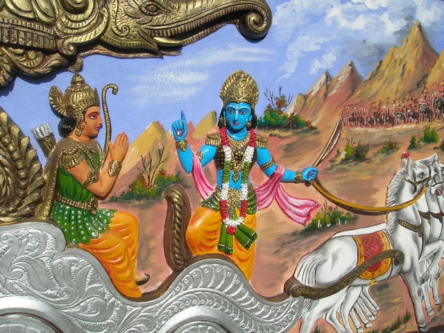 Krishna narrating the Gita to Arjuna