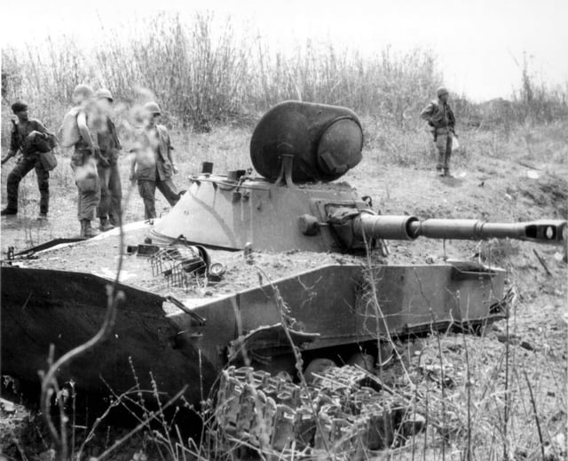 One of two PT-76s from the NVA 202nd Armored Regiment, destroyed by US M48 Pattons, from the 1/69th Armored battalion, during the battle of Ben Het, March 3, 1969, Vietnam.