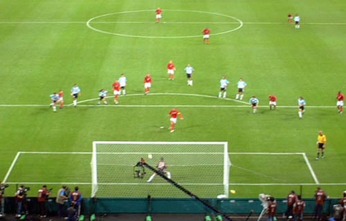 Beckham scoring a penalty against Argentina at the 2002 World Cup