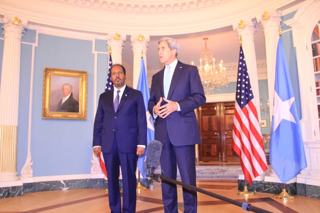 Former President of Somalia Hassan Sheikh Mohamud with U.S. Secretary of State John Kerry at the State Department (September 2013)