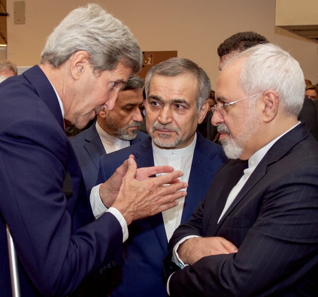 Kerry with Hossein Fereydoun and Mohammad Javad Zarif during the announcement of the Joint Comprehensive Plan of Action, July 14, 2015