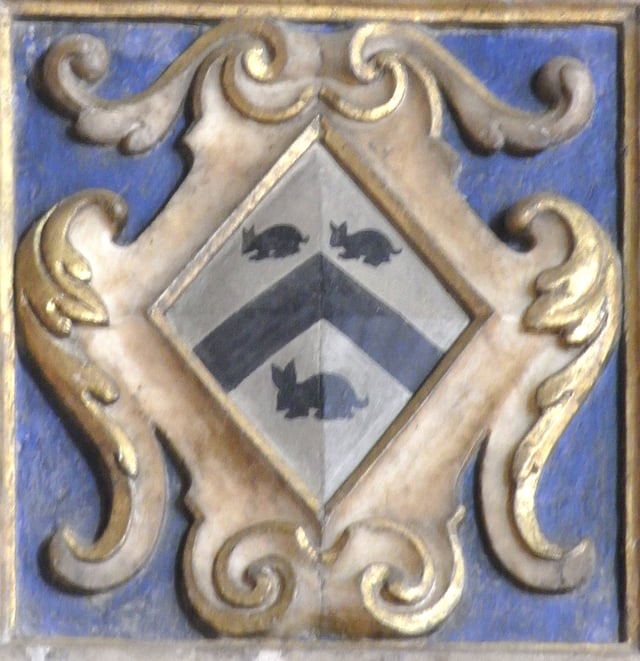 Arms of Strode: Argent, a chevron between three conies courant sable, detail from mural monument to Ursula Strode (d.1635), 1st wife of Sir John III Chichester (d.1669) of Hall and daughter of Sir William II Strode (d.1637). Bishop's Tawton Church