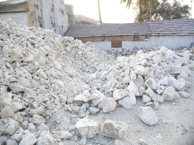 White stones used to make one type of Kolam flour