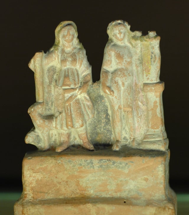 Artemis (on the left, with a deer) and Apollo (on the right, holding a lyre) from Myrina, dating to approximately 25 BC
