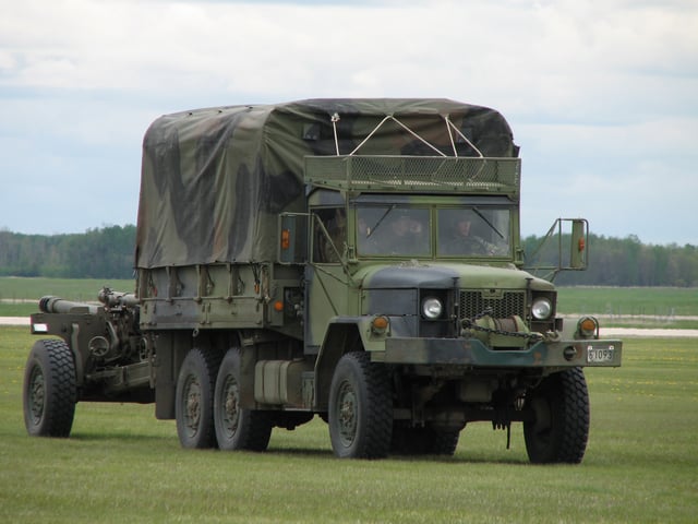 Bombardier MLVW licensed version of M35, with C3 howitzer in tow