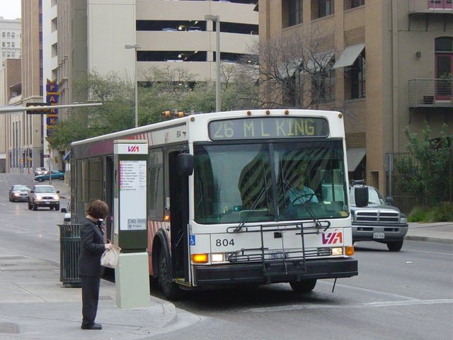 A VIA bus stopped at a Downtown San Antonio intersection