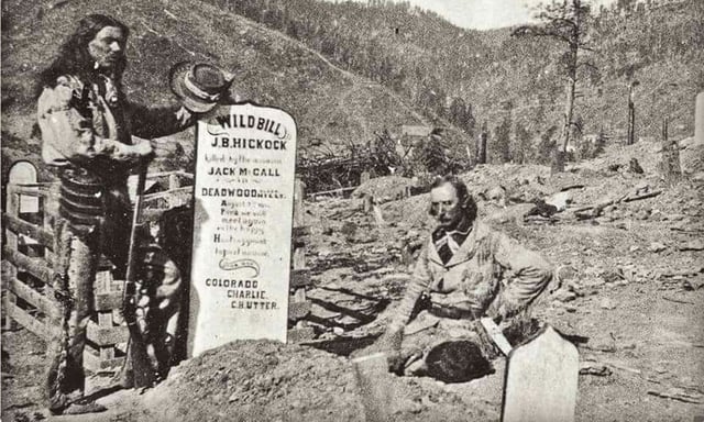 Steve and Charlie Utter at Hickok's grave, photograph date unknown