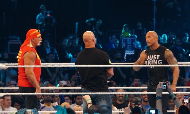 Hogan (left) along Stone Cold Steve Austin and The Rock at WrestleMania XXX in April 2014