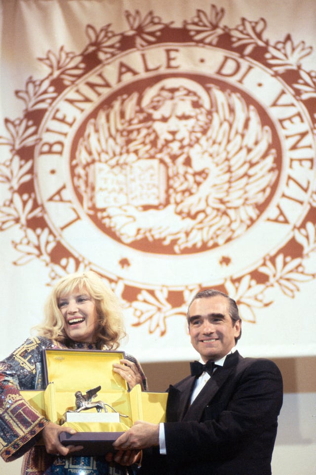 Scorsese receives Golden Lion for Lifetime Achievement from actress Monica Vitti at the Venice Film Festival in 1995