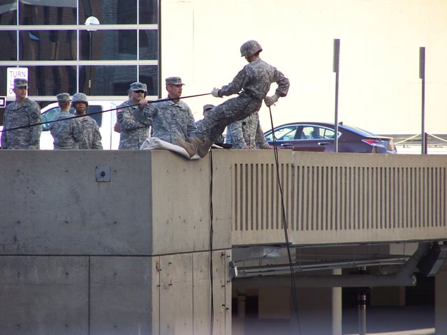 An Army ROTC unit practicing rapelling from a parking garage in September 2010