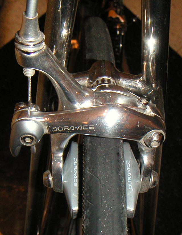 Dual-pivot caliper brake.