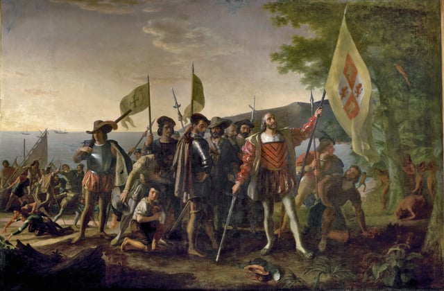 A depiction of Columbus's first landing, claiming possession of the New World for Spain in caravels; the Niña and the Pinta, on Watling Island, an island of the Bahamas that the natives called Guanahani and that he named San Salvador, on 12 October 1492.