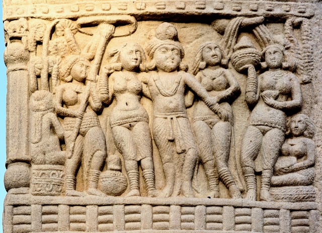 Ashoka and his two queens, in a relief at Sanchi. The identification with Ashoka is confirmed by the similar relief from Kanaganahalli inscribed "Raya Asoka".