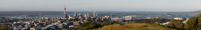 Auckland cityscape viewed from Maungawhau / Mount Eden. The large body of water is the Waitematā Harbour.