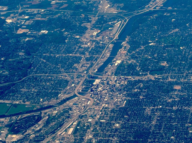 A view looking north of Grand Rapids. US 131 runs vertically through the center of the image while interchanges are visible with I-196 in the center and I-96 near the top.