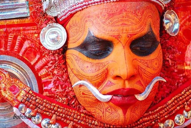 "Mukathezhuthu"-The face painting of Theyyam, the religious ritual art form in Thalassery