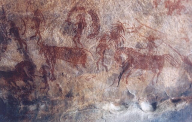 Bhimbetka rock painting showing man riding on horse, India