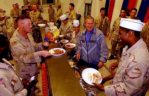 U.S. President George W. Bush visits Iraq to have Thanksgiving dinner with soldiers in November 2003