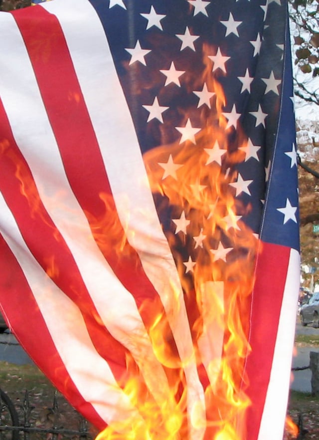 U.S. flag being burned in protest on the eve of the 2008 election.