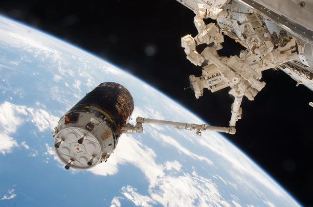 Kounotori 6 grappled by the International Space Station's robotic arm