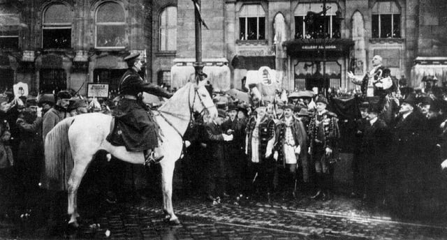 Admiral Miklós Horthy enters Budapest at the head of the National Army, 16 November 1919. He is greeted by city officials in front of the Gellért Hotel. The Romanian army retreated from Budapest on 14 November, leaving Horthy to enter the city, where in a fiery speech he accused the capital's citizens of betraying Hungary by supporting Bolshevism