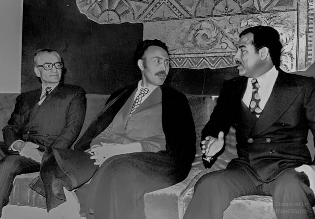 The Shah meeting Algerian President Houari Boumediène and Iraqi Vice President Saddam Hussein in Algiers in order to sign the 1975 Algiers Agreement